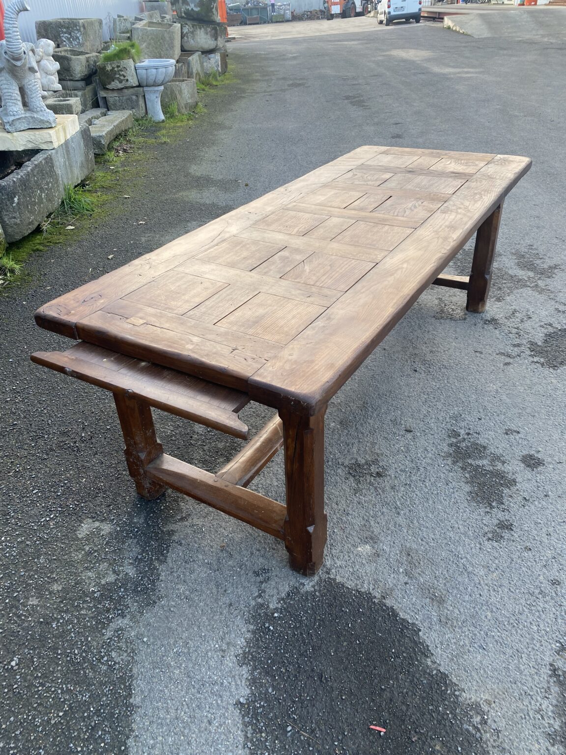 Fabulous French oak Table . Top has panels configuration. Bread board in one end. C : 44. Town and Country Antiques