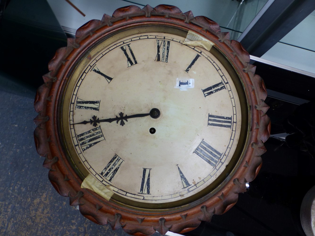 Fussee Wall Clock with carved case. Town and Country Antiques