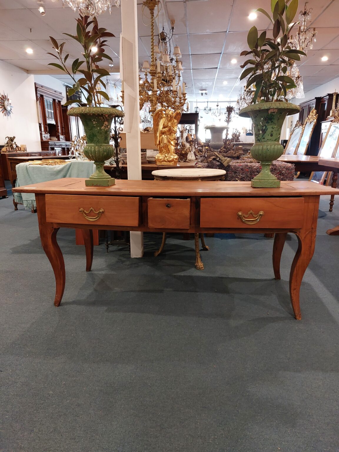 French Cherrywood side table with 3 Drawers. Shaped legs and original handles. Town and Country Antiques
